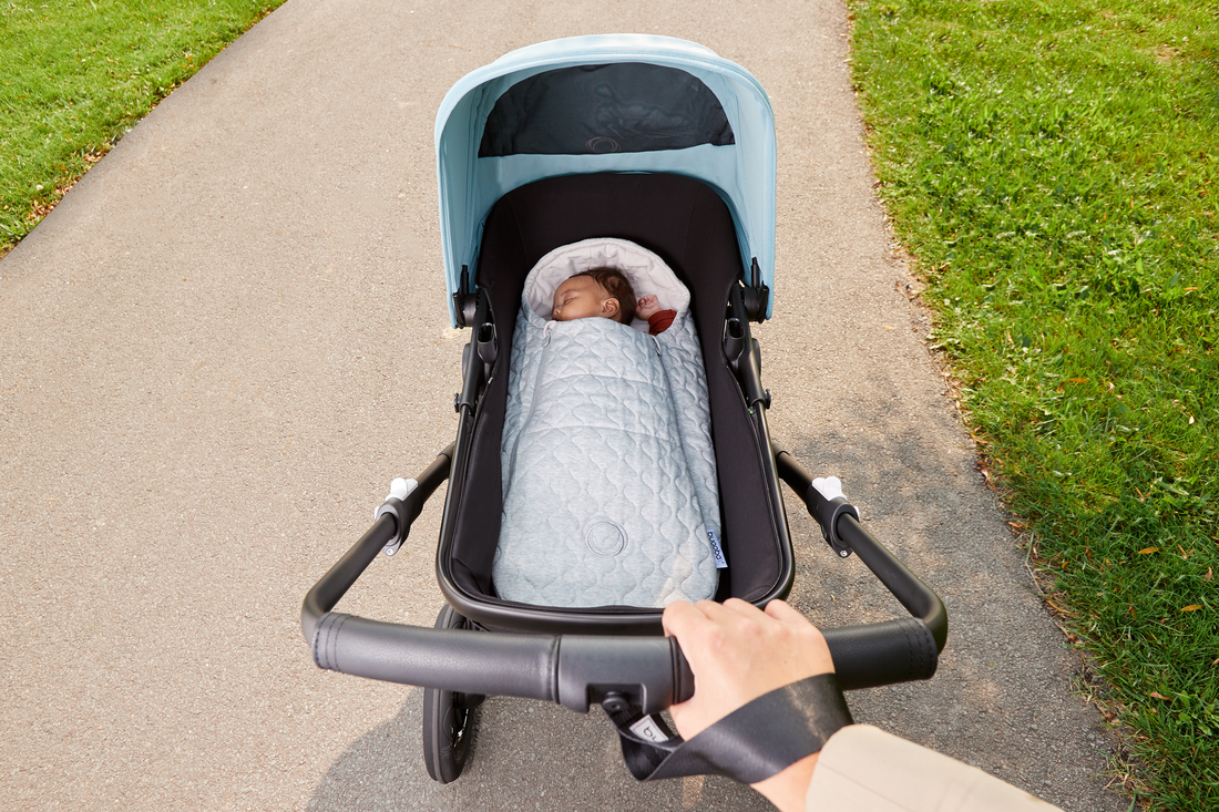 Baby sleeping in Bugaboo stroller