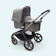 Kinderwagen_Bugaboo_Fox_5_grey_melange_Ansicht_mit_bassinet_von_vorne_rechts #farbe_grey-melange